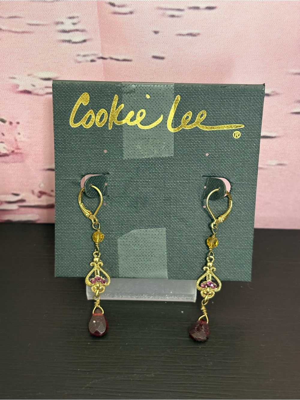 Cookie Lee gold tone dangle earrings filigree metalwork red crystals. New.